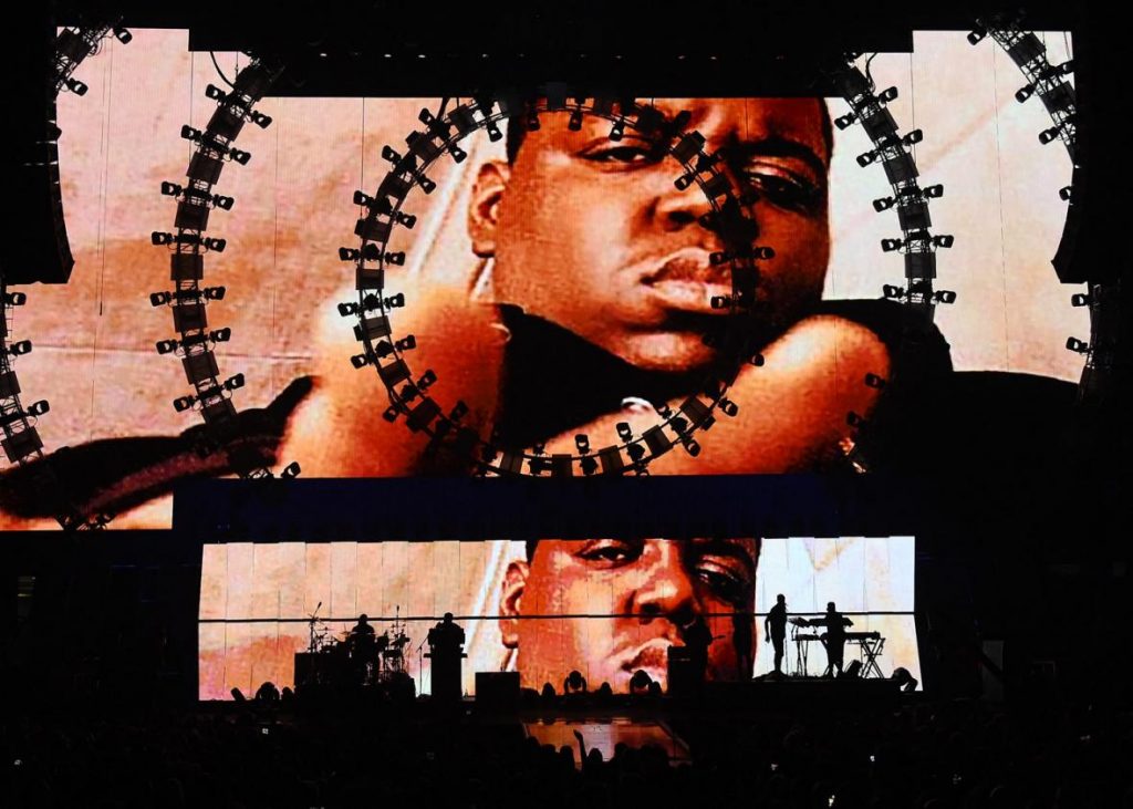 Images of the late rapper the Notorious B.I.G. are shown during a performance by recording artist Sean Combs at the 2015 iHeartRadio Music Festival at MGM Grand Garden Arena on Sept. 19, 2015 in Las Vegas.